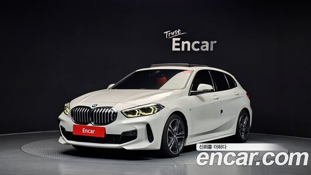 BMW 1-Series 2021 — photo 1