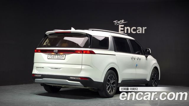 Kia Canival 2021 — photo 2