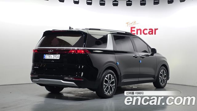 Kia Canival 2023 — photo 2
