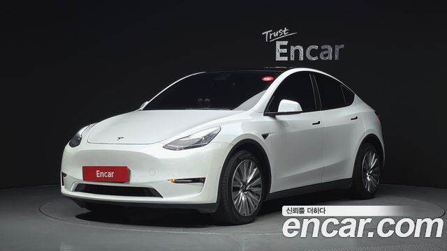 Tesla Model Y 2021 — photo 1