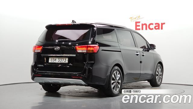 Kia Canival 2015 — photo 2