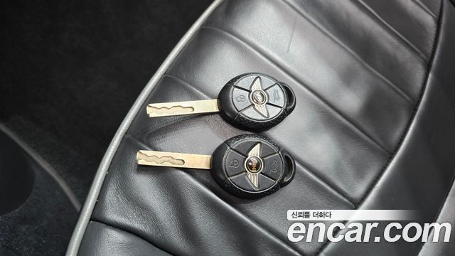 Mini Cooper 2006 — photo 18