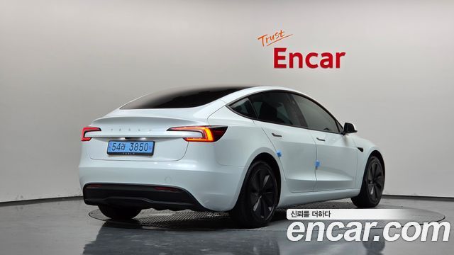 Tesla Model 3 2024 — photo 2