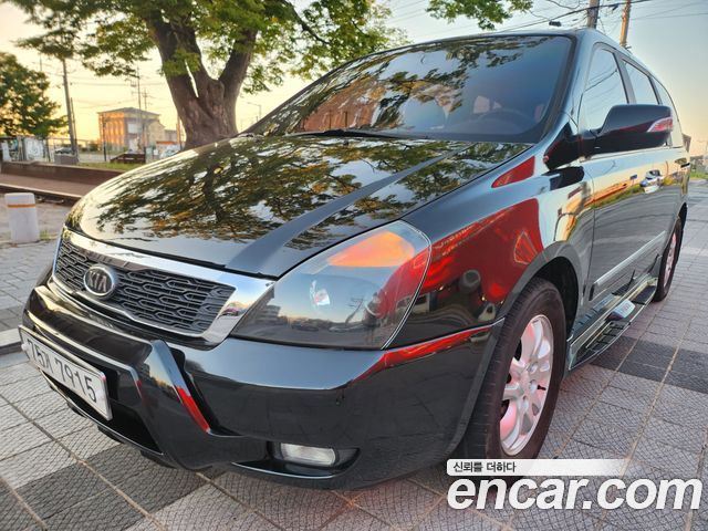 Kia Canival 2012 — photo 3