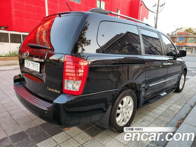 Kia Canival 2012 — photo 4