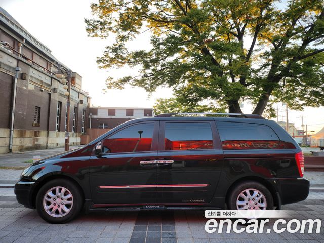 Kia Canival 2012 — photo 5