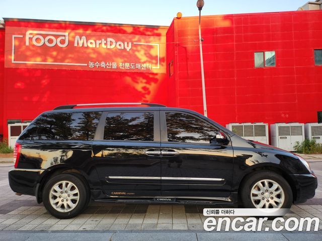 Kia Canival 2012 — photo 8