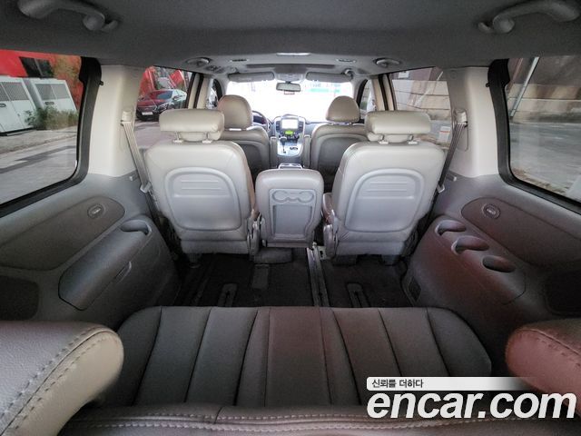 Kia Canival 2012 — photo 10