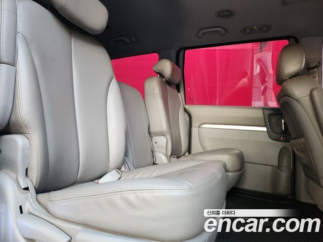 Kia Canival 2012 — photo 13