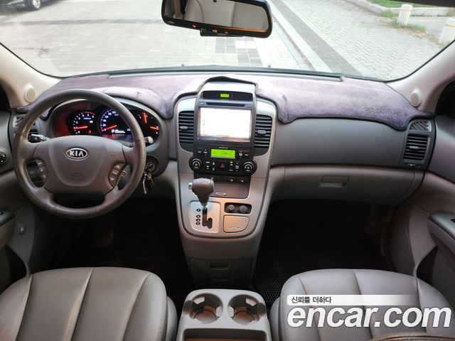 Kia Canival 2012 — photo 15
