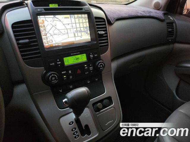 Kia Canival 2012 — photo 17