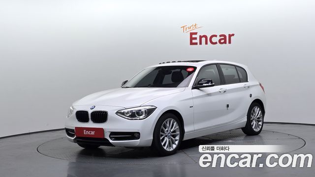 BMW 1-Series 2015 — photo 1