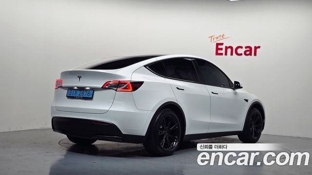 Tesla Model Y 2021 — photo 2