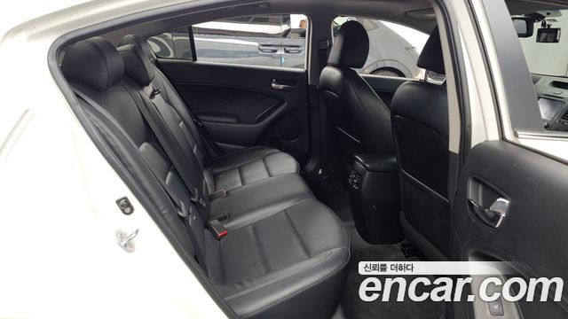 Kia K3 2013 — photo 12
