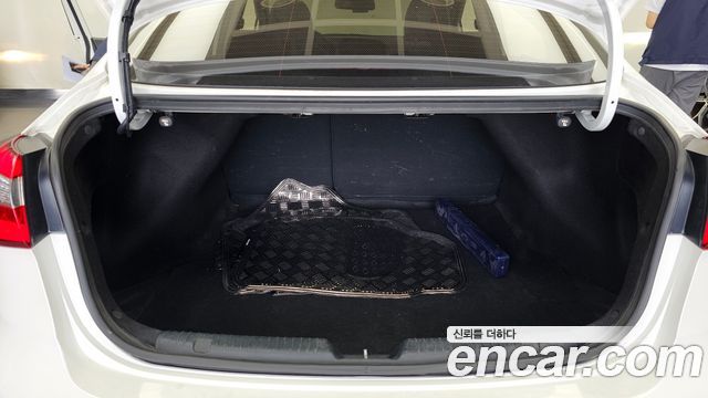 Kia K3 2013 — photo 20