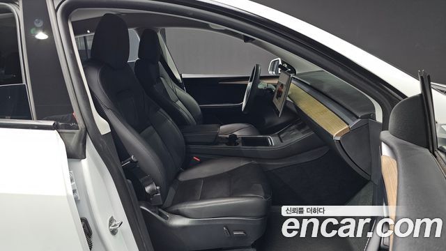 Tesla Model Y 2023 — photo 16