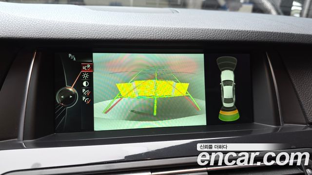 BMW 5-Series 2014 — photo 14