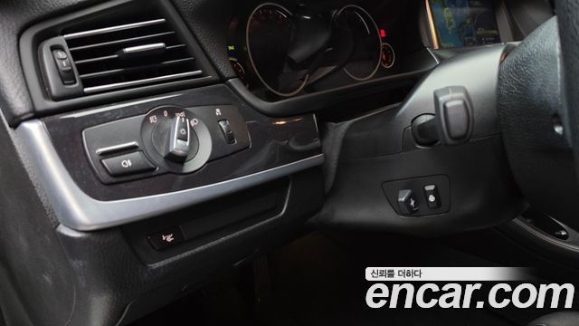 BMW 5-Series 2014 — photo 17