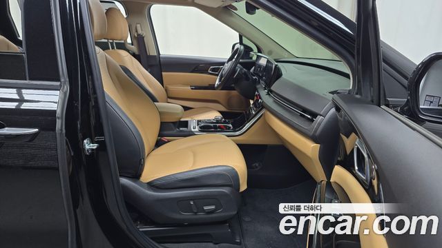 Kia Canival 2023 — photo 11