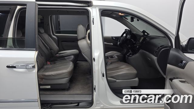 Kia Canival 2014 — photo 11