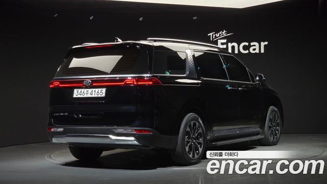 Kia Canival 2021 — photo 2
