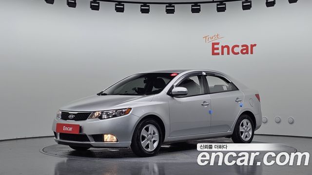Kia Porte 2011 — photo 1