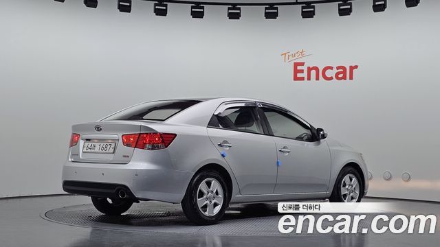 Kia Porte 2011 — photo 2