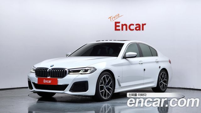 BMW 5-Series 2022 — photo 1