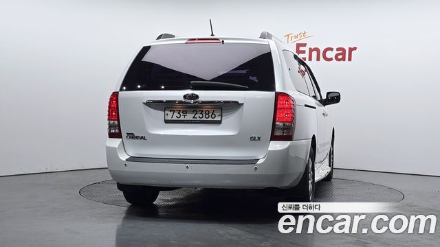 Kia Canival 2012 — photo 4