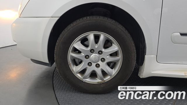 Kia Canival 2012 — photo 5