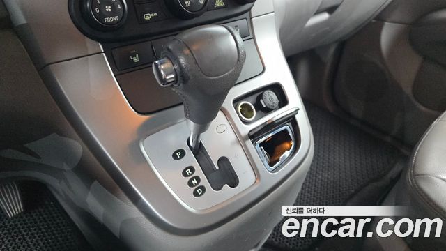 Kia Canival 2012 — photo 12