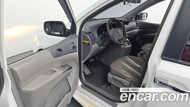 Kia Canival 2012 — photo 13
