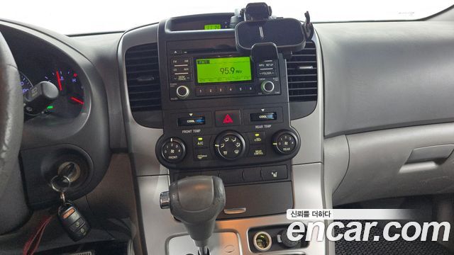 Kia Canival 2012 — photo 19