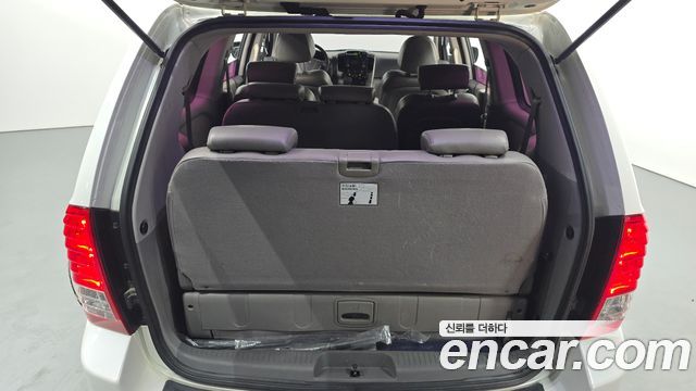 Kia Canival 2012 — photo 26
