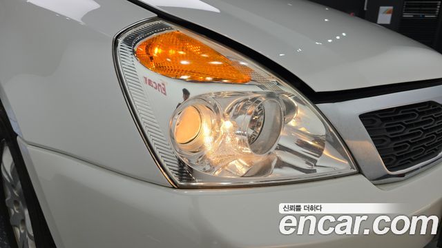 Kia Canival 2012 — photo 8
