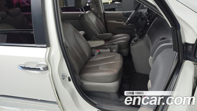 Kia Canival 2012 — photo 16