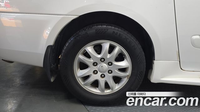Kia Canival 2012 — photo 27