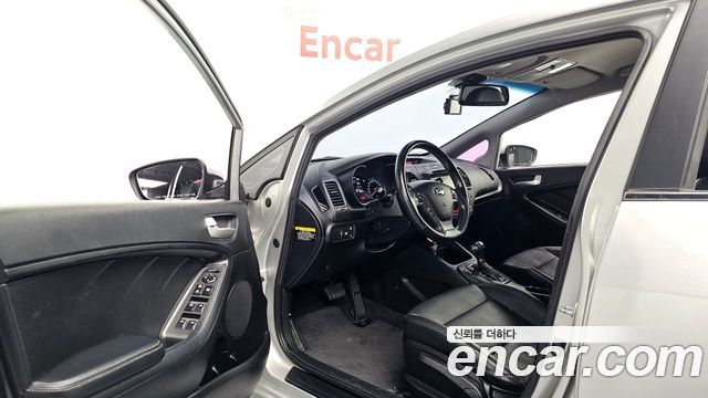 Kia K3 2013 — photo 13