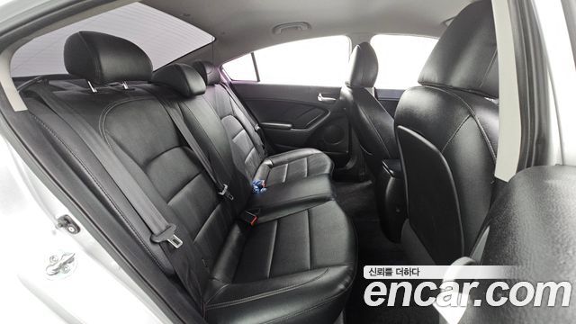 Kia K3 2013 — photo 17