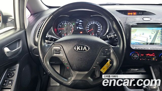 Kia K3 2013 — photo 19