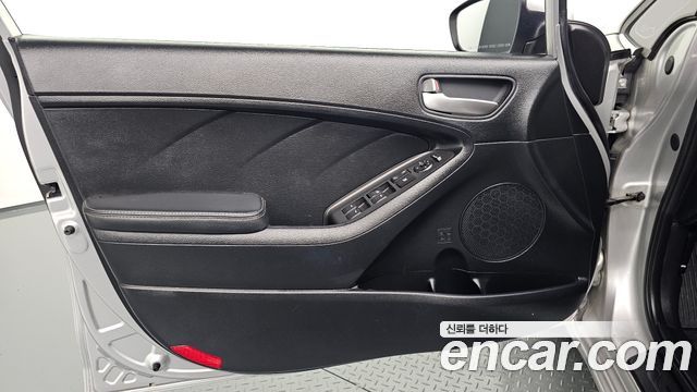 Kia K3 2013 — photo 14