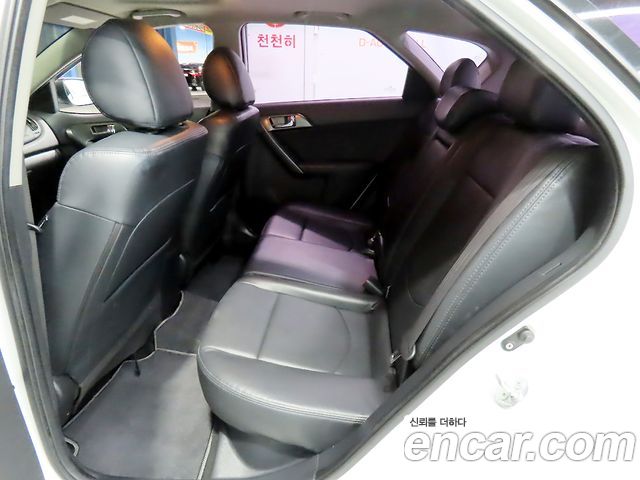 Kia Porte 2013 — photo 11