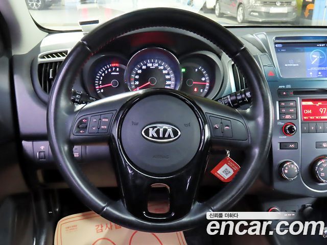 Kia Porte 2013 — photo 15