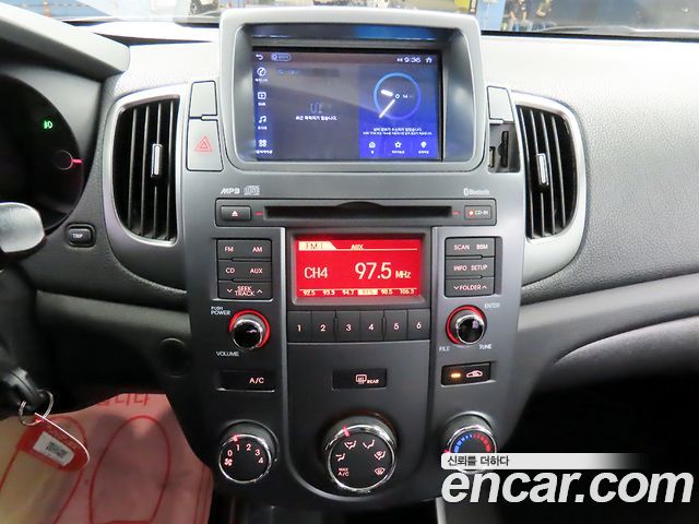 Kia Porte 2013 — photo 16