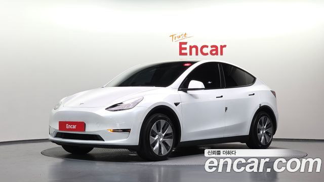 Tesla Model Y 2021 — photo 1