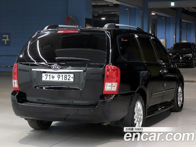 Kia Canival 2012 — photo 4