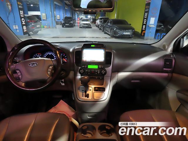 Kia Canival 2012 — photo 5