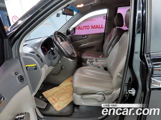 Kia Canival 2012 — photo 6