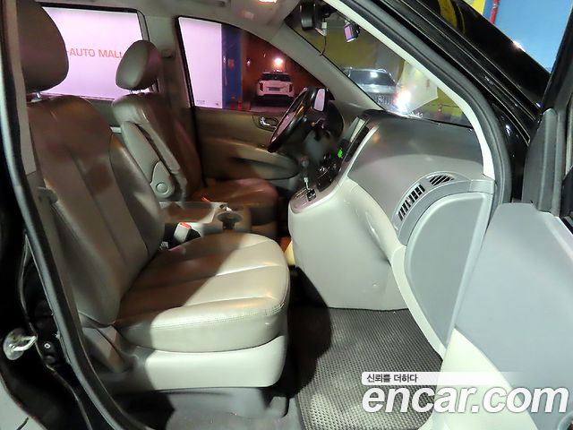 Kia Canival 2012 — photo 9