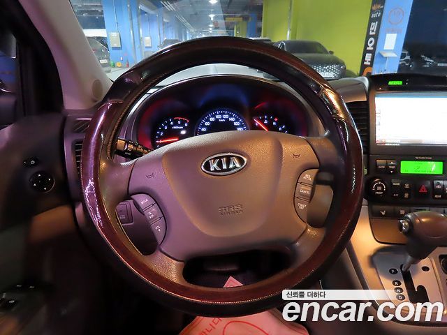 Kia Canival 2012 — photo 11